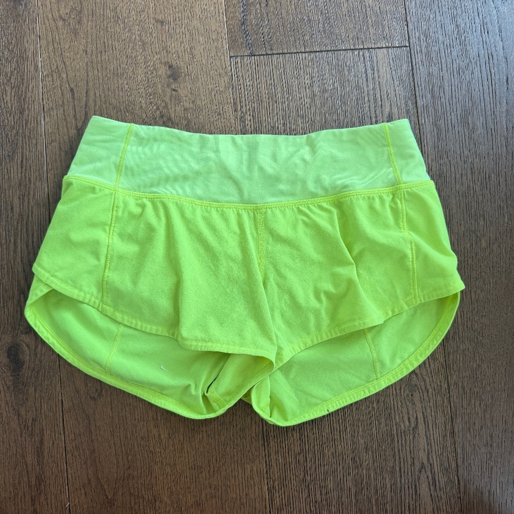 Lululemon speed up shorts with 2.5 inch inseam and in neon yellow